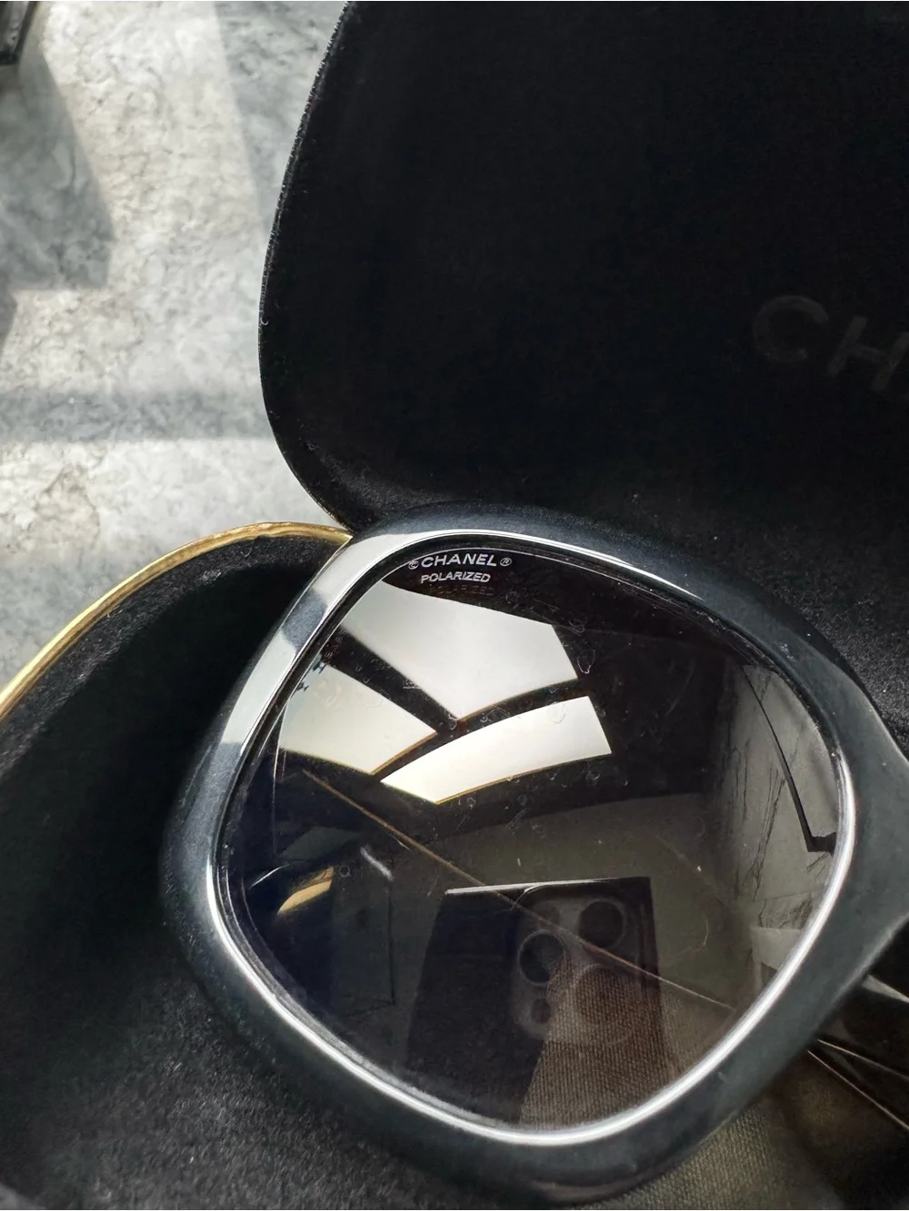 CHANEL Black Sunglasses with Gold Logo Accent