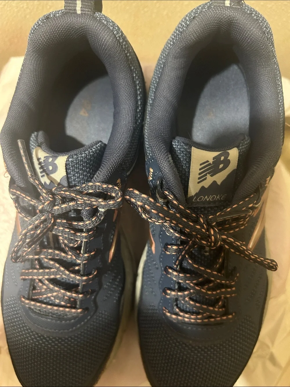 New Balance Women’s Navy with Rose Gold Accent Sneakers