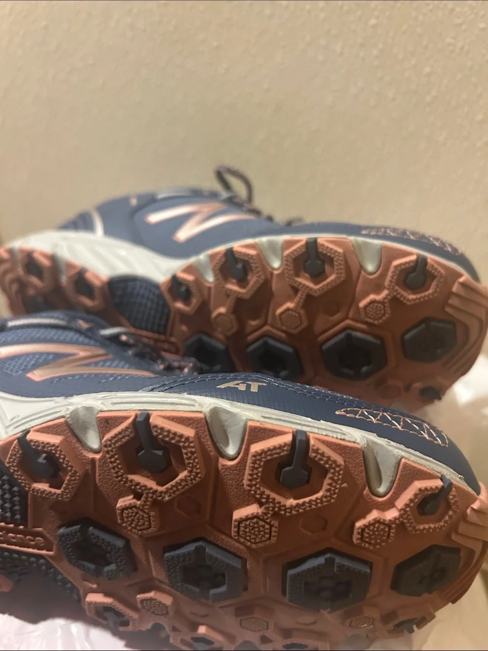 New Balance Women’s Navy with Rose Gold Accent Sneakers