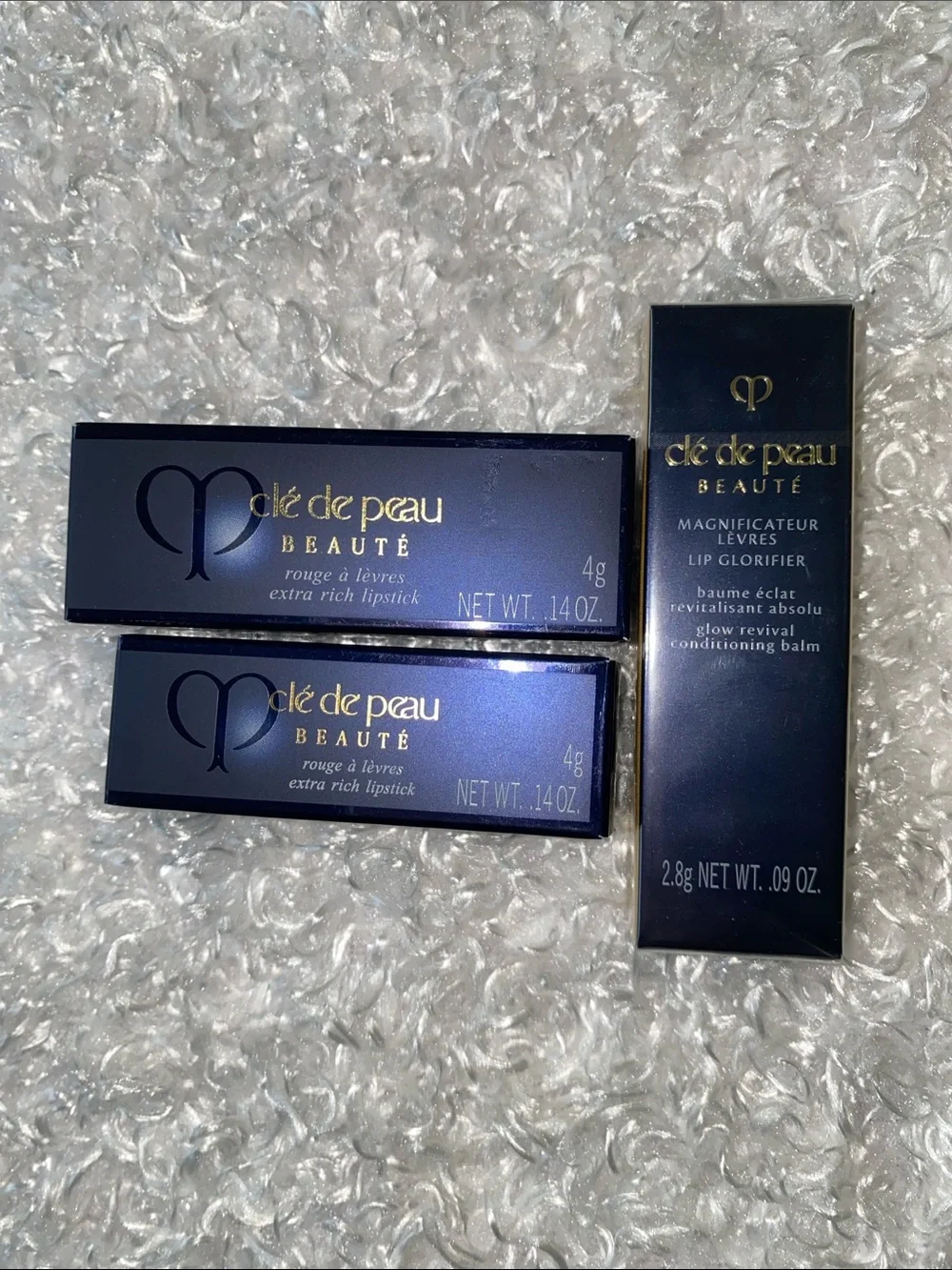 Bundle of Cle de peau lipstick and lip Conditioning balm