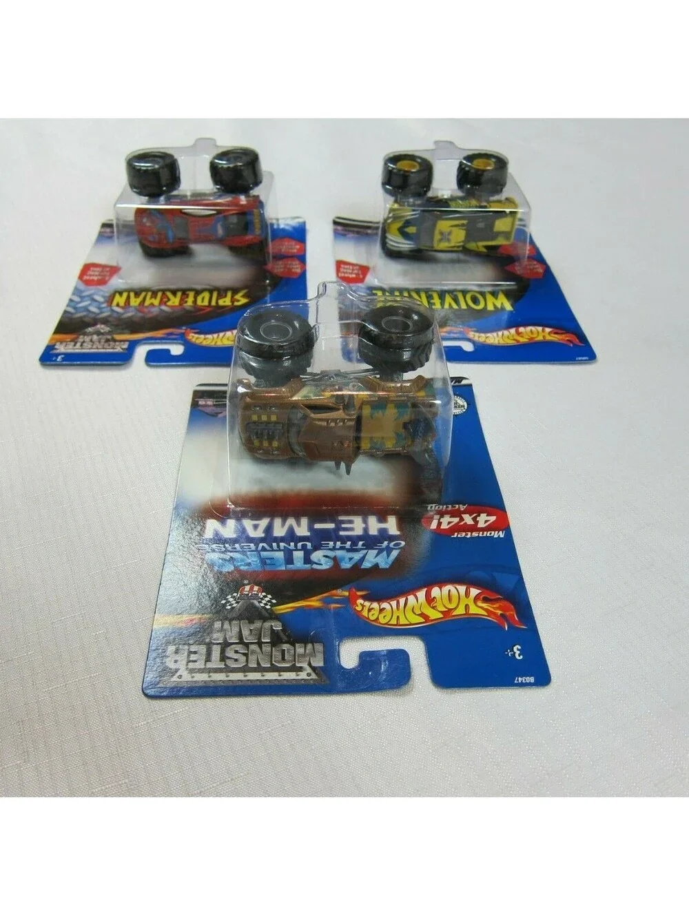 Lot of 3 Vintage Hot Wheels Monster Jam Wolverine, Spider-Man & He-Man 1:64 NEW
