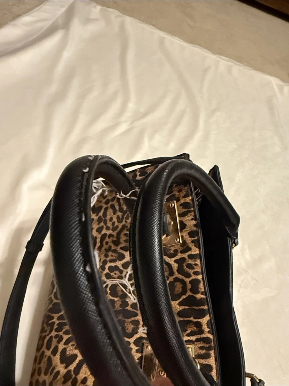 Leopard Print Tote Bag with Black Handles and Gold Hardware. The wallet included