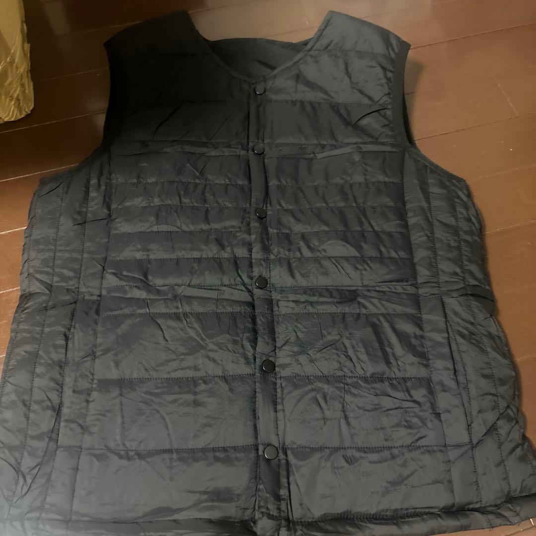 Black quilted down vest, size L