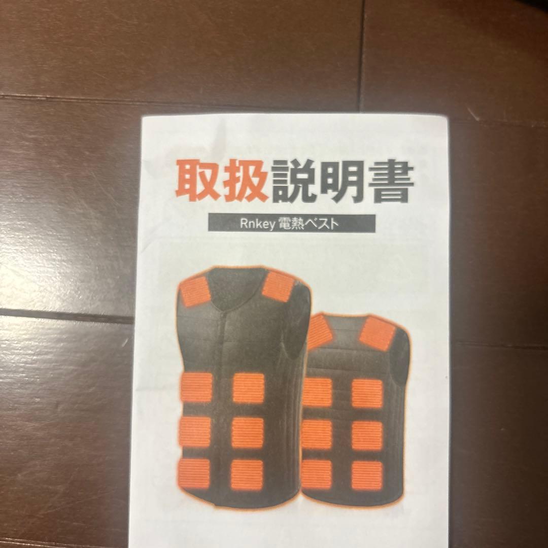 Black quilted down vest, size L